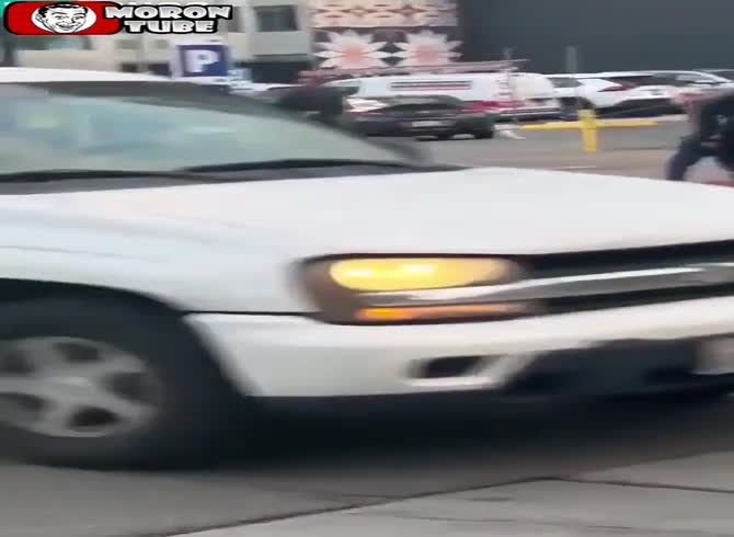 Video :An inebriated man tries to drive pedestrians over with an SUV